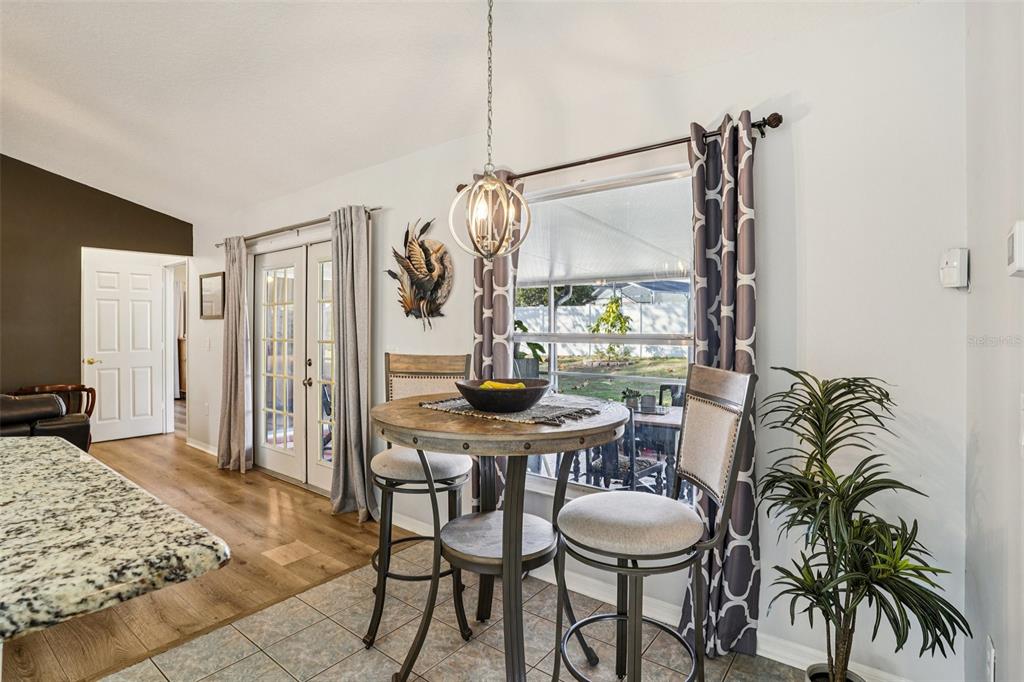 2052 Onecco Court Clermont, FL 34714 - Photo 8 of 33 a view of a room with a table and chairs