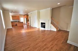 a view of kitchen with furniture and fireplace