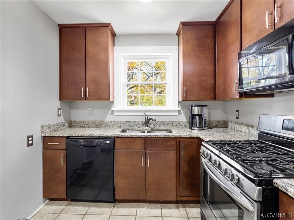1600 Wentbridge Road Richmond, VA 23227 - Photo 12 of 31 Kitchen with granite countertops and gas cooking