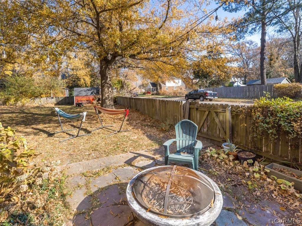 1600 Wentbridge Road Richmond, VA 23227 - Photo 31 of 31 Patio with firepit off of screened porch
