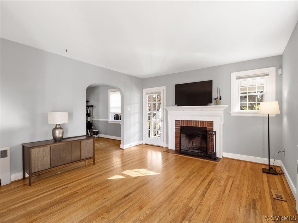 1600 Wentbridge Road Richmond, VA 23227 - Photo 8 of 31 Living room, with hardwood floors and a wood burni