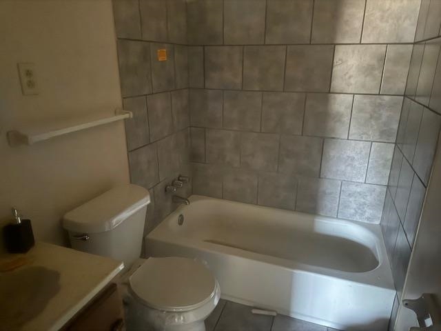 3437 Ridgemont Avenue Memphis, TN 38128 - Photo 8 of 16 Full bathroom featuring toilet, tiled shower / bath combo, vanity, and tile patterned flooring
