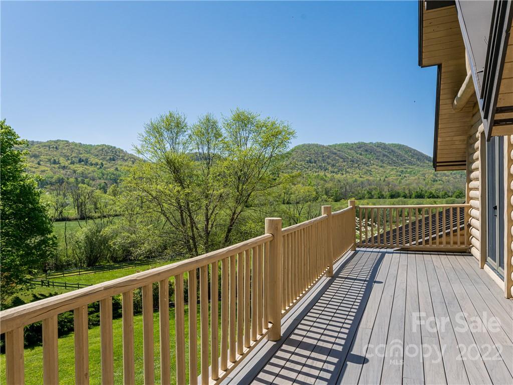 1030 Cane Creek Road Fletcher, NC 28732 - Photo 14 of 48 a view of a balcony with wooden floor