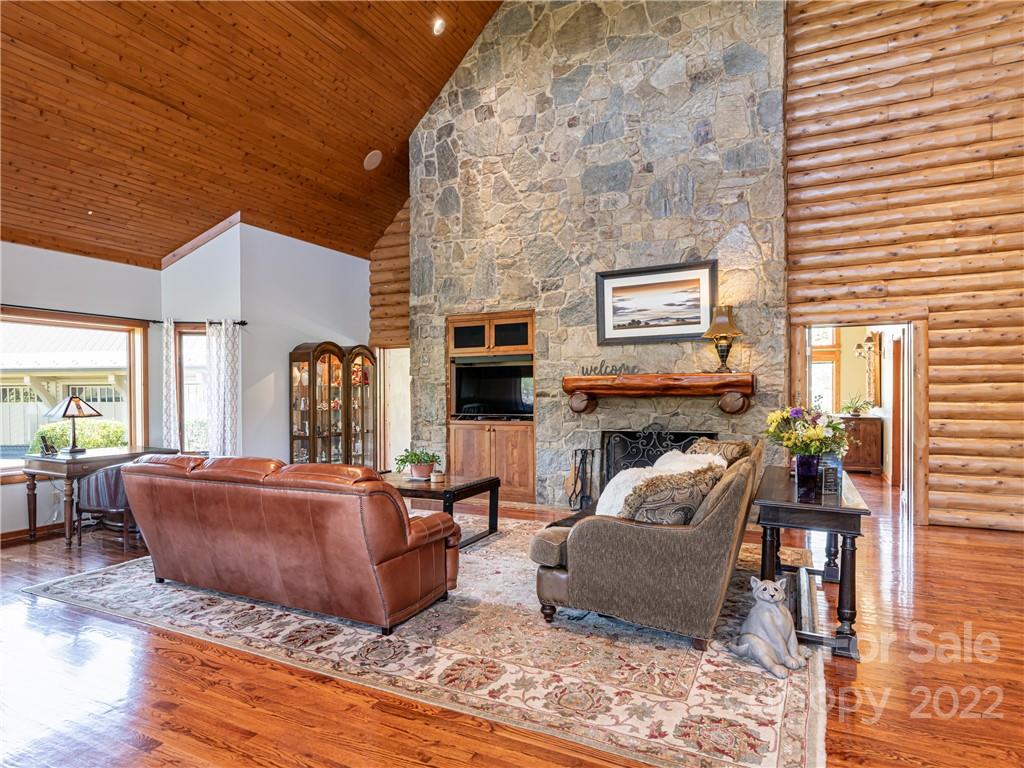 1030 Cane Creek Road Fletcher, NC 28732 - Photo 5 of 48 a living room with furniture and a fireplace