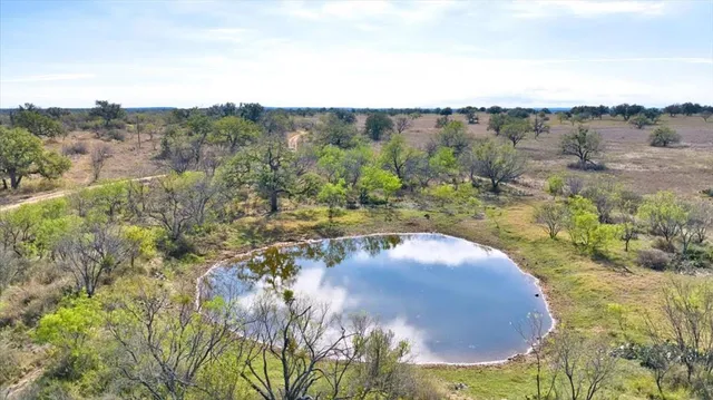 a view of a swimming pool with an outdoor space