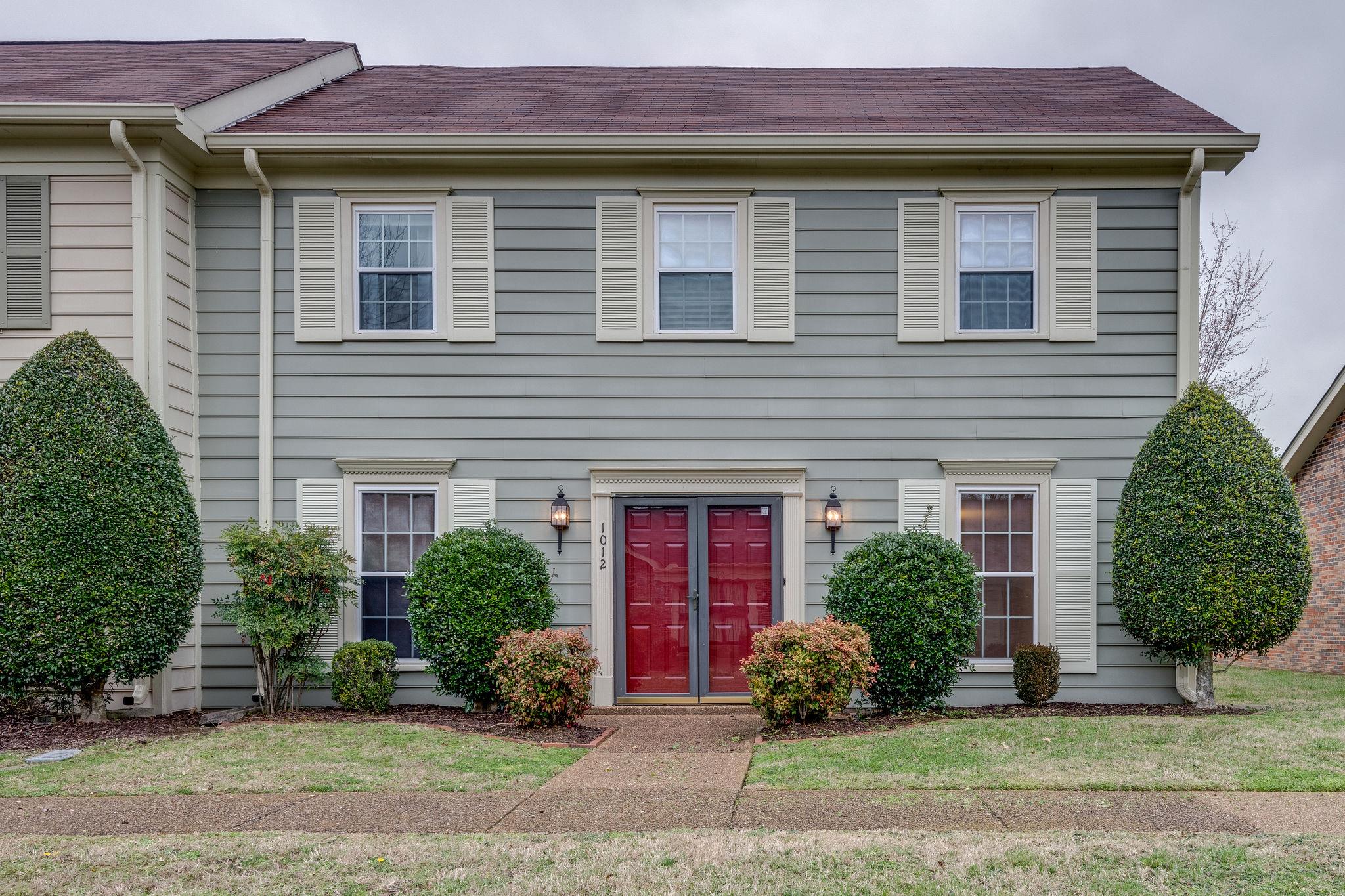 1012 General George Patton Road Nashville, TN 37221 - Photo 1 of 28 a front view of a house with garden
