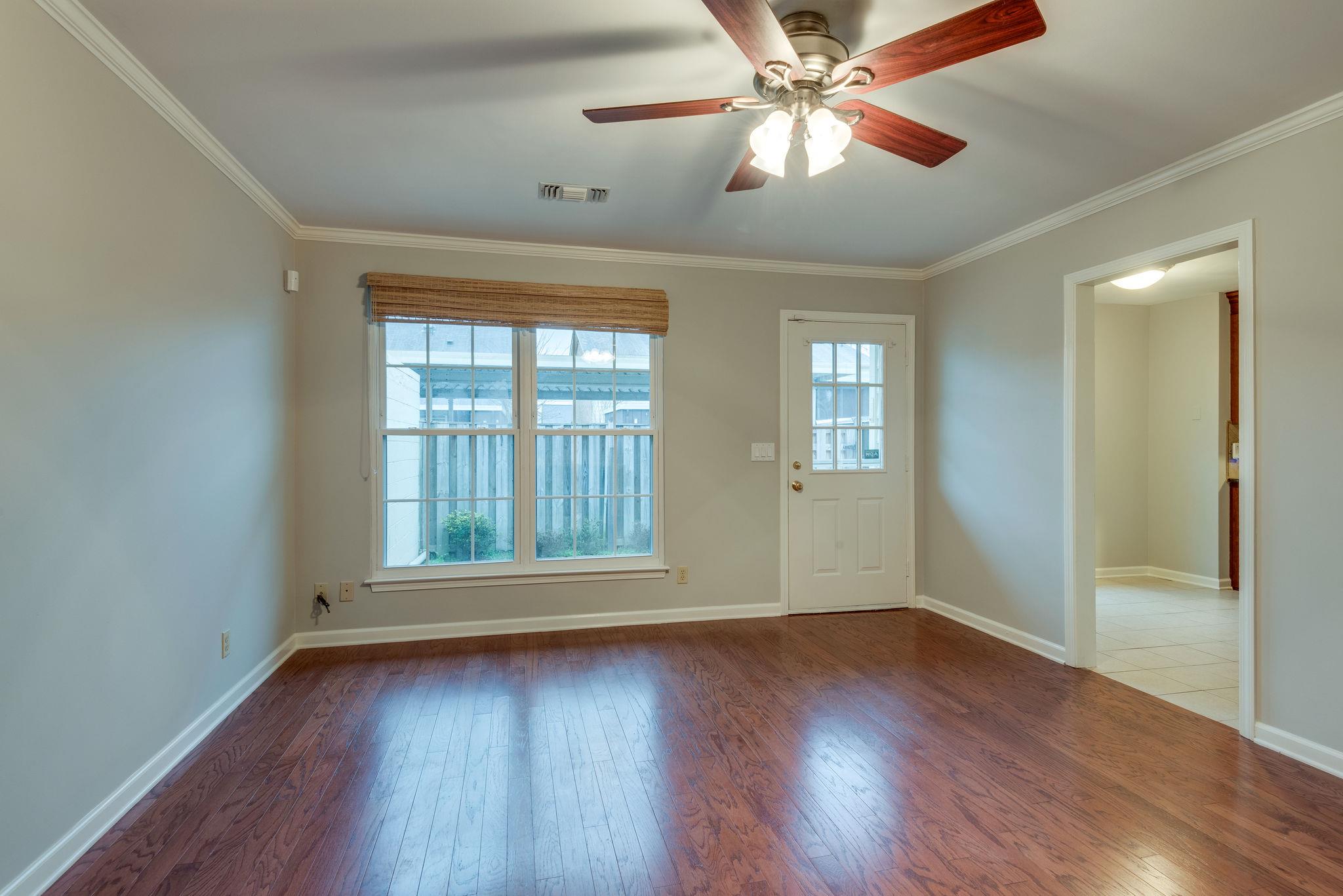 1012 General George Patton Road Nashville, TN 37221 - Photo 15 of 28 a view of an empty room with wooden floor and a window