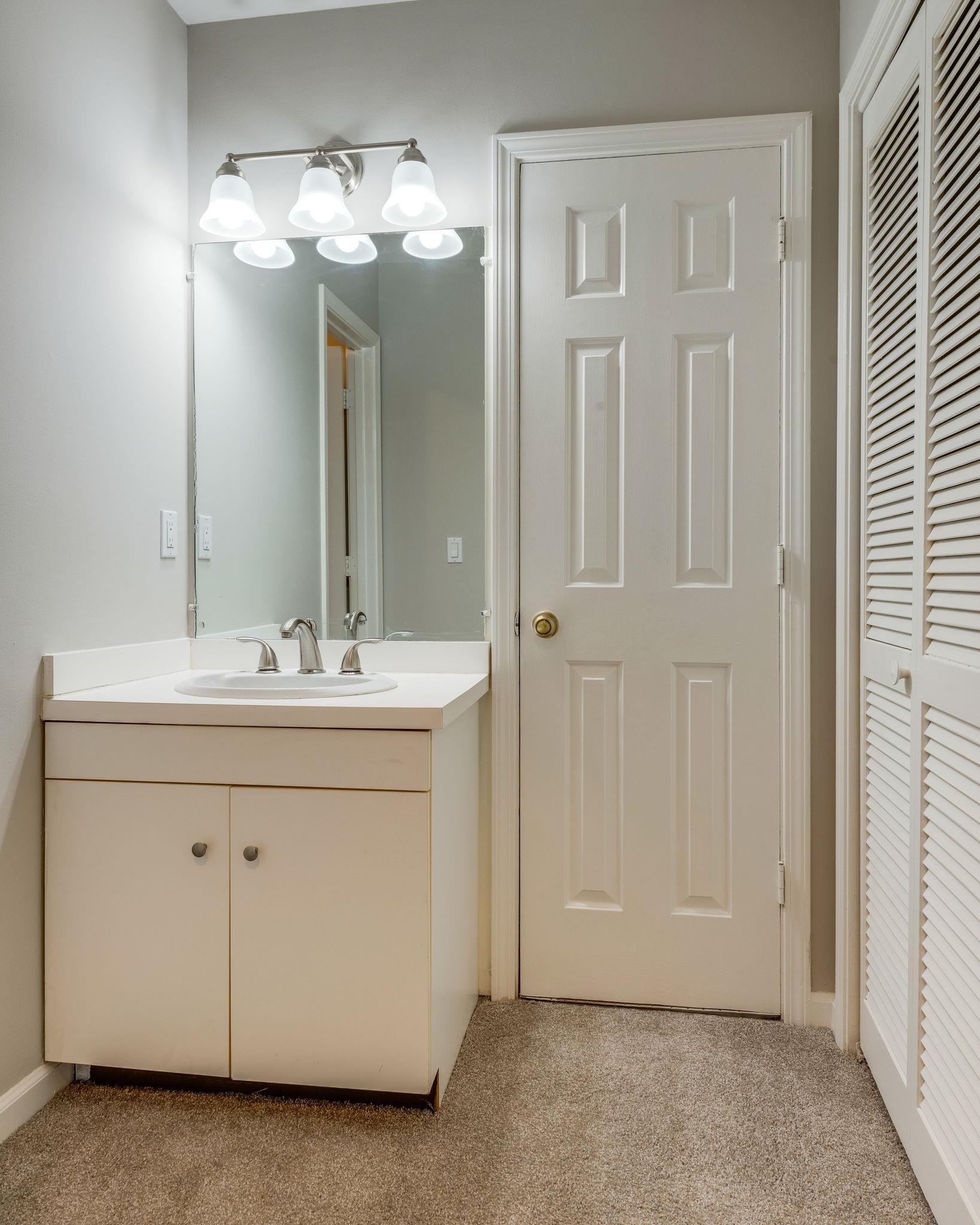 1012 General George Patton Road Nashville, TN 37221 - Photo 20 of 28 a bathroom with a sink double vanity and a mirror