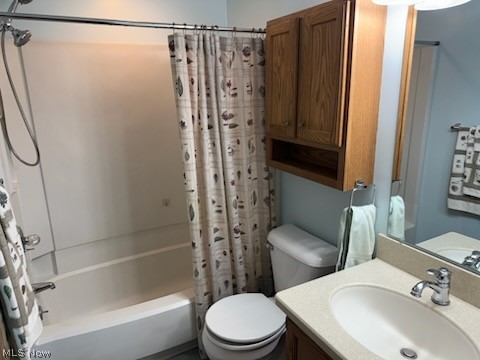 97 Park Road Painesville, OH 44077 - Photo 15 of 18 Bathroom with shower / bath combination with curtain and vanity