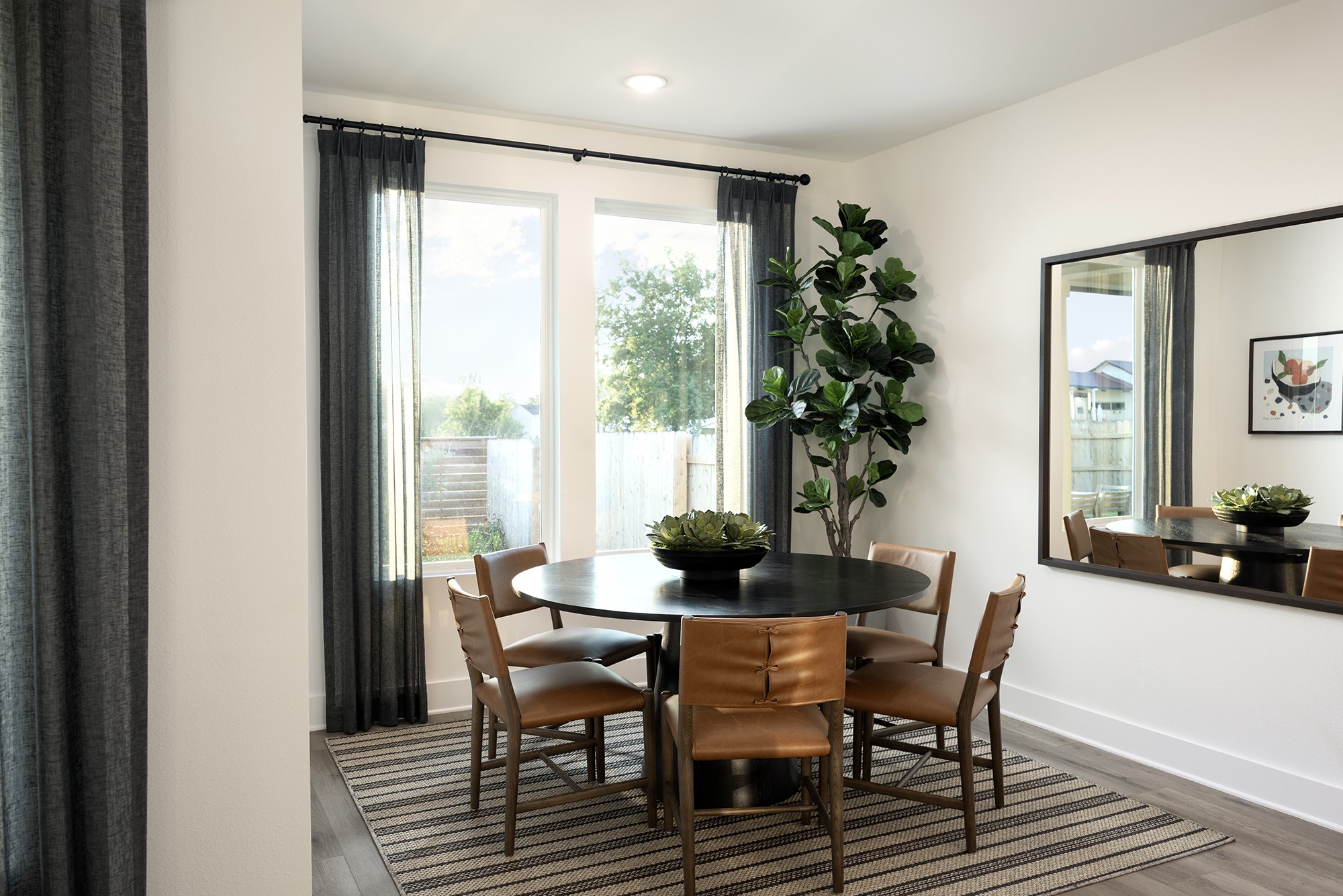 270 Romans Road Kyle, TX 78640 - Photo 4 of 23 a dining room with furniture window and wooden floor