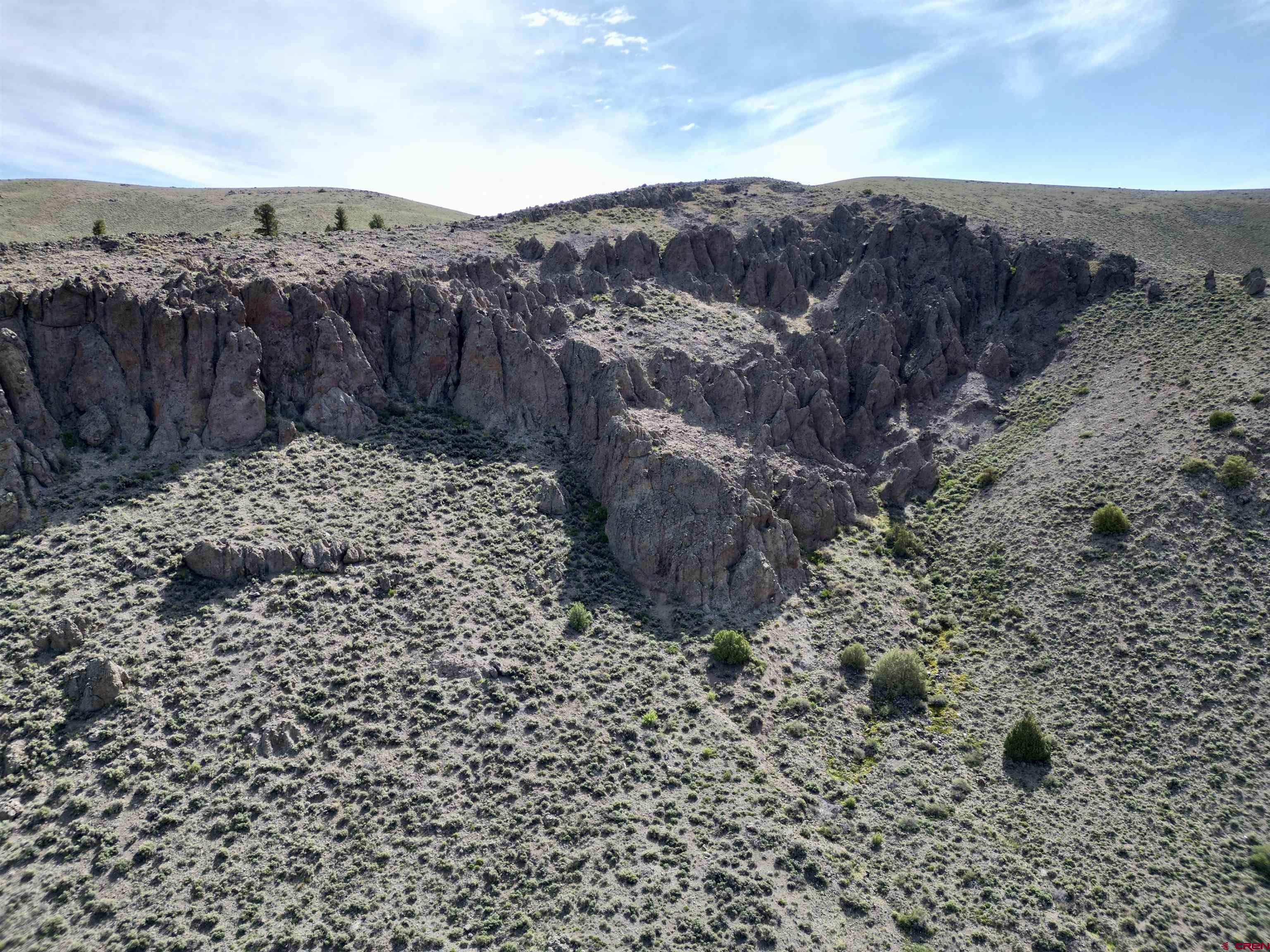 17 County Road 17 Gunnison, CO 81230 - Photo 9 of 21 a view of a dry yard with wooden fence