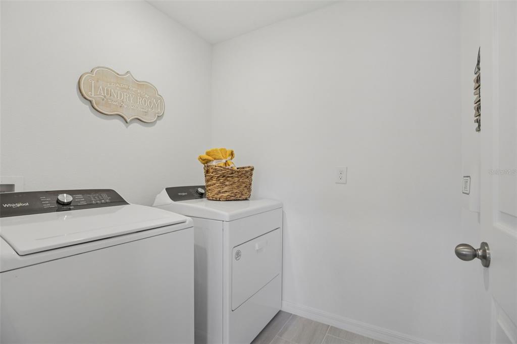 28005 Poppy Court Leesburg, FL 34748 - Photo 33 of 54 a utility room with dryer and washer