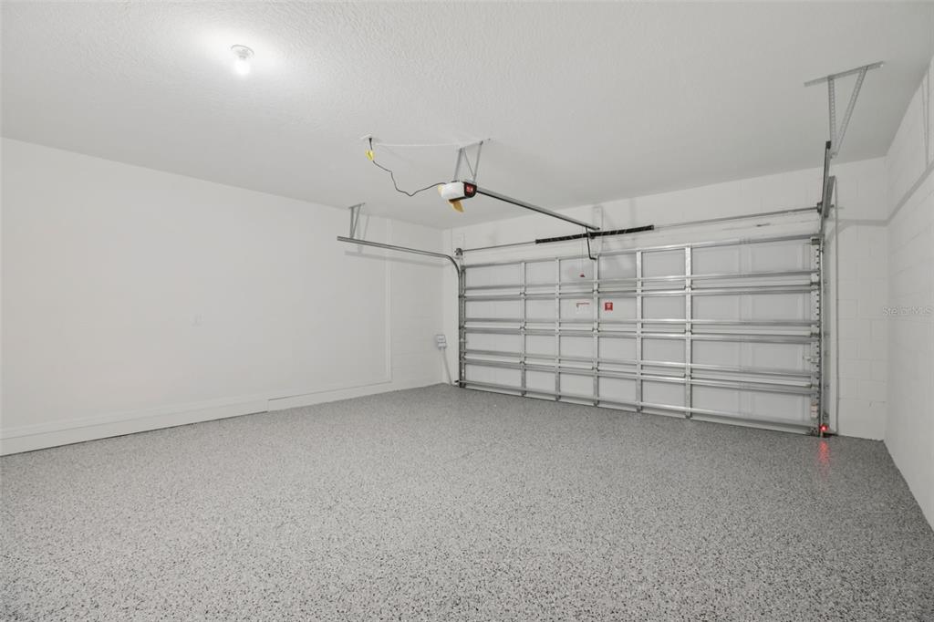 28005 Poppy Court Leesburg, FL 34748 - Photo 44 of 54 a view of a garage