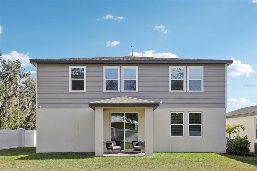 28005 Poppy Court Leesburg, FL 34748 - Photo 51 of 54 a view of a house with yard and sitting area