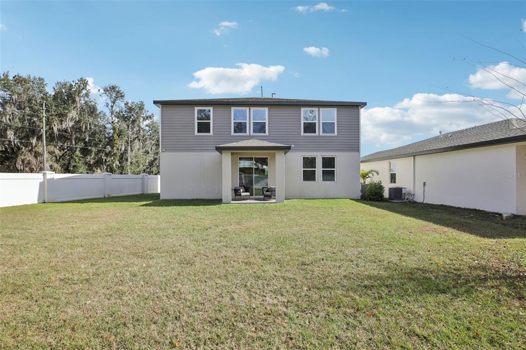 28005 Poppy Court Leesburg, FL 34748 - Photo 52 of 54 a house view with a garden space