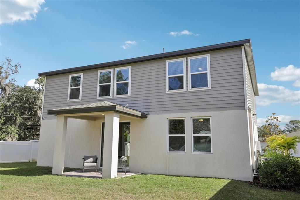 28005 Poppy Court Leesburg, FL 34748 - Photo 54 of 54 a house view with a garden space