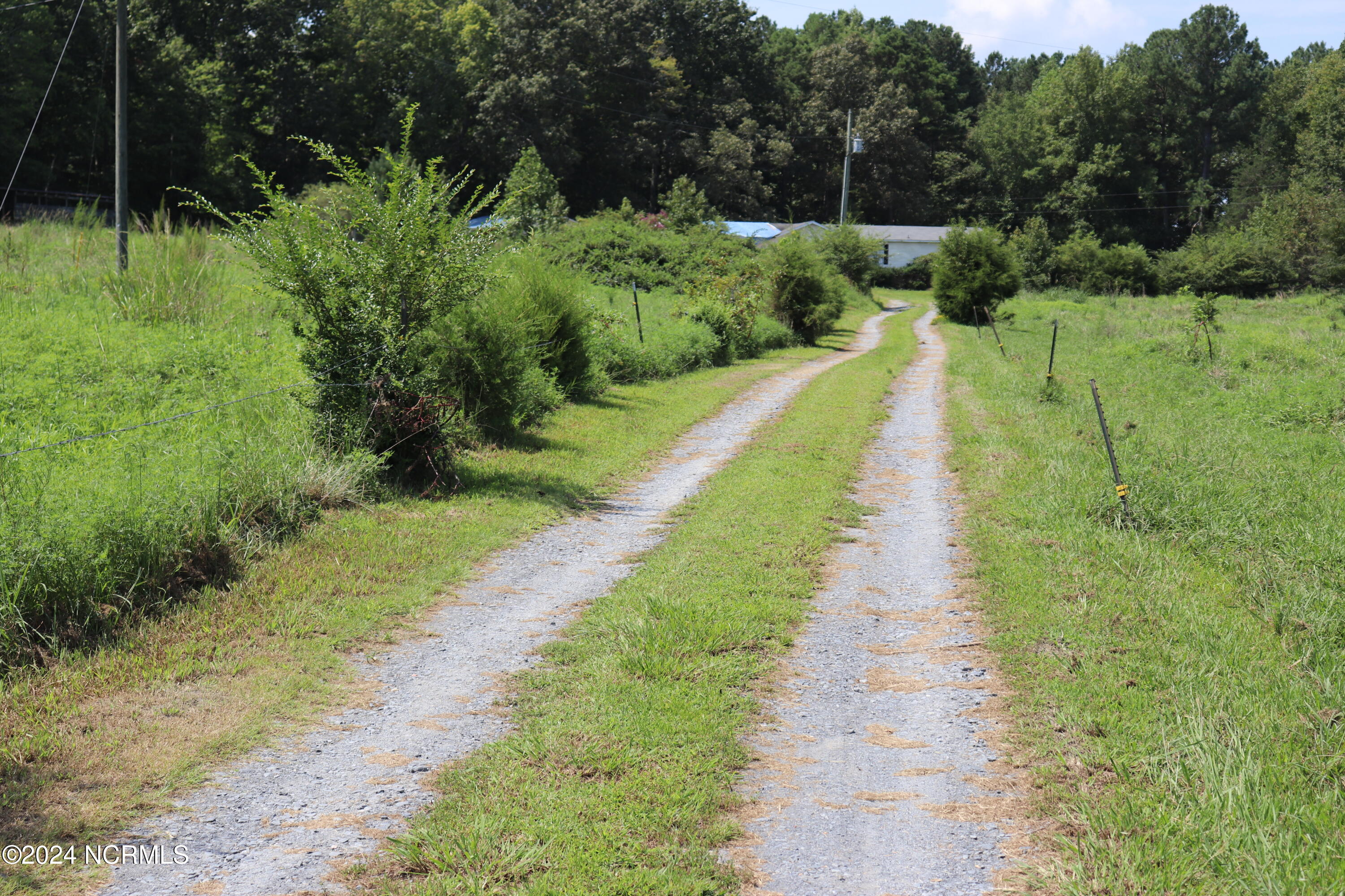 165 Kmj Ranch Road Troy, NC 27371 - Photo 21 of 58 Road access to residence at 165 KMJ Ranch
