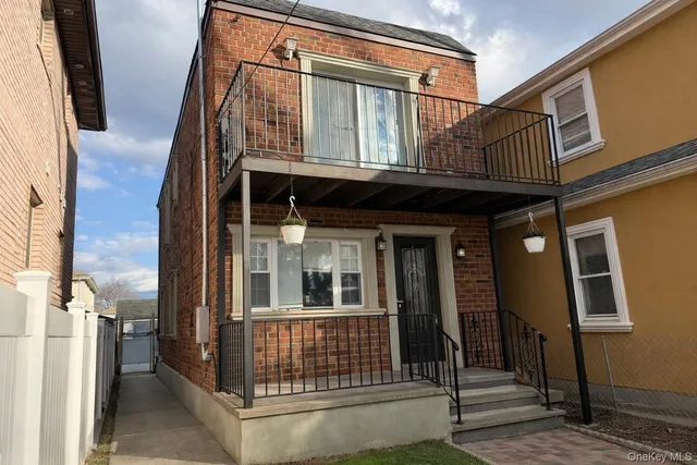 a front view of a house with a porch