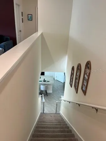 a view of a hallway with workspace