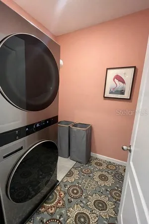 a close up of a toilet and dryer