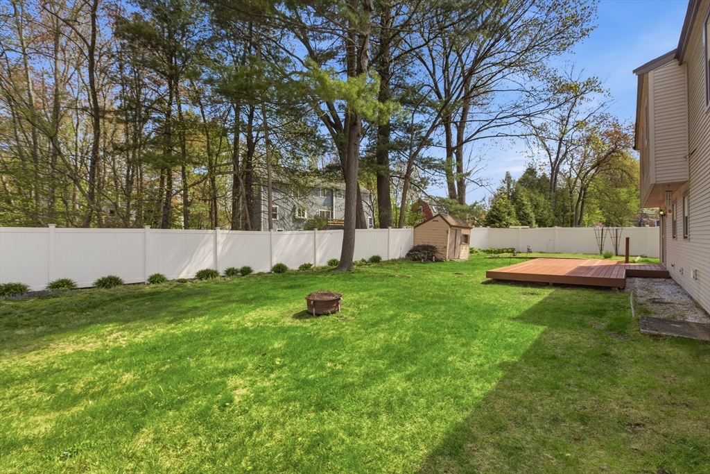 19 Mockingbird Lane Maynard, MA 01754 - Photo 33 of 34 a view of yard with tree s