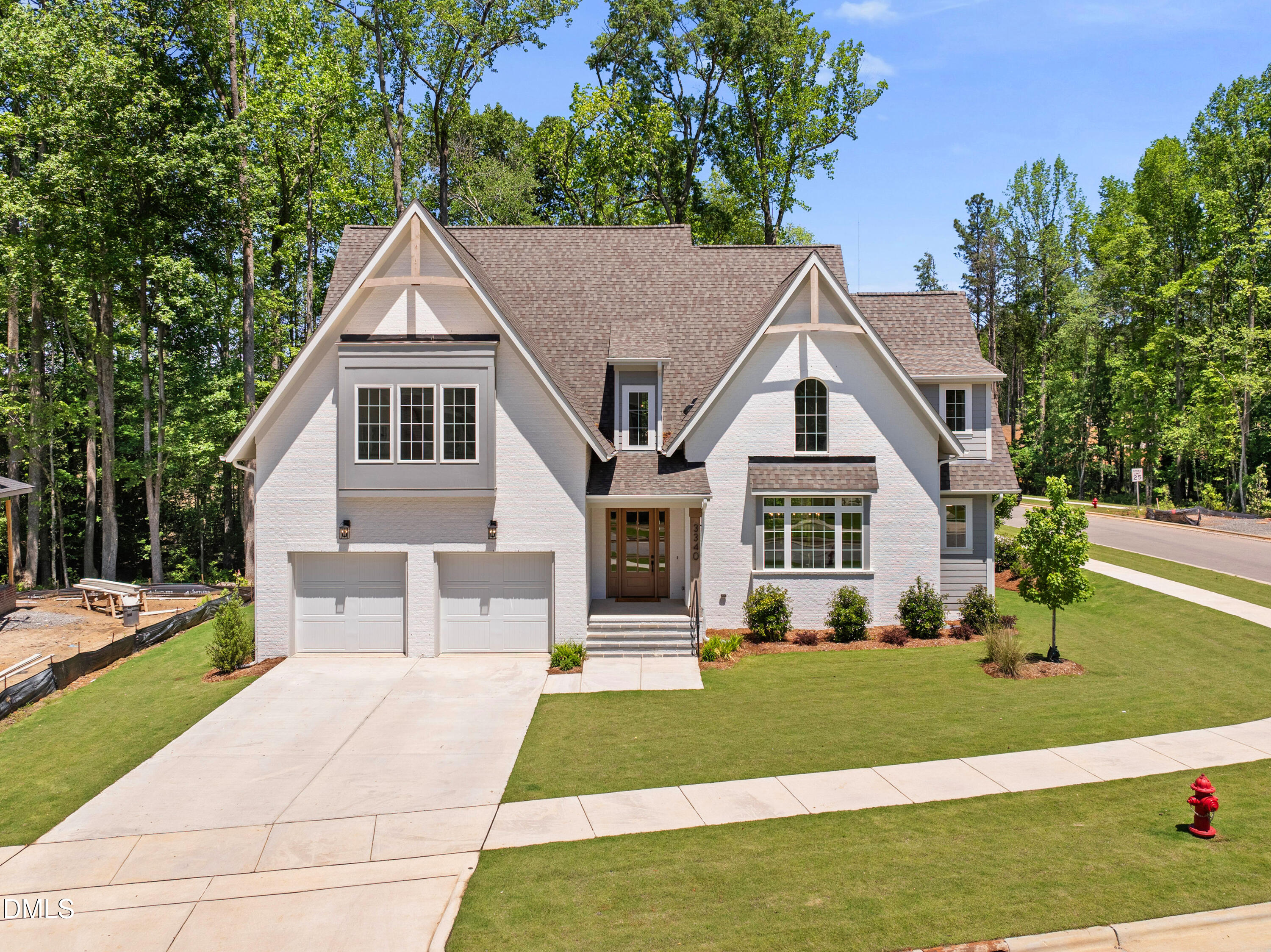 3340 Colby Chase Drive Apex, NC 27539 - Photo 61 of 80 a front view of a house with a yard