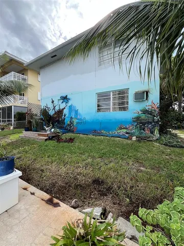 a view of backyard with outdoor space