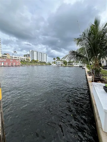 a view of a lake with a big yard