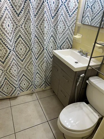 a room with a table and a window