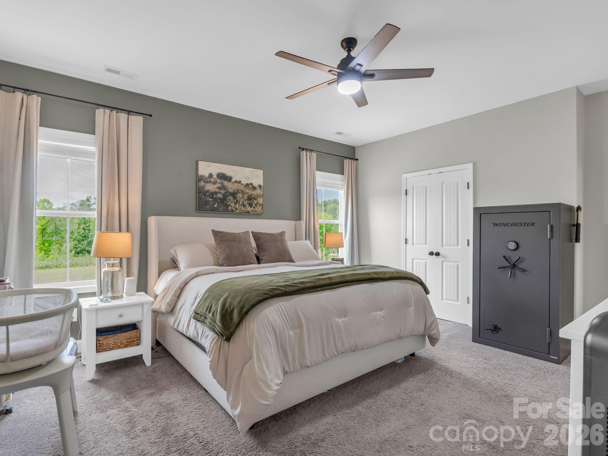 288 Maypole Court Forest City, NC 28043 - Photo 16 of 47 a bedroom with a large bed and a window
