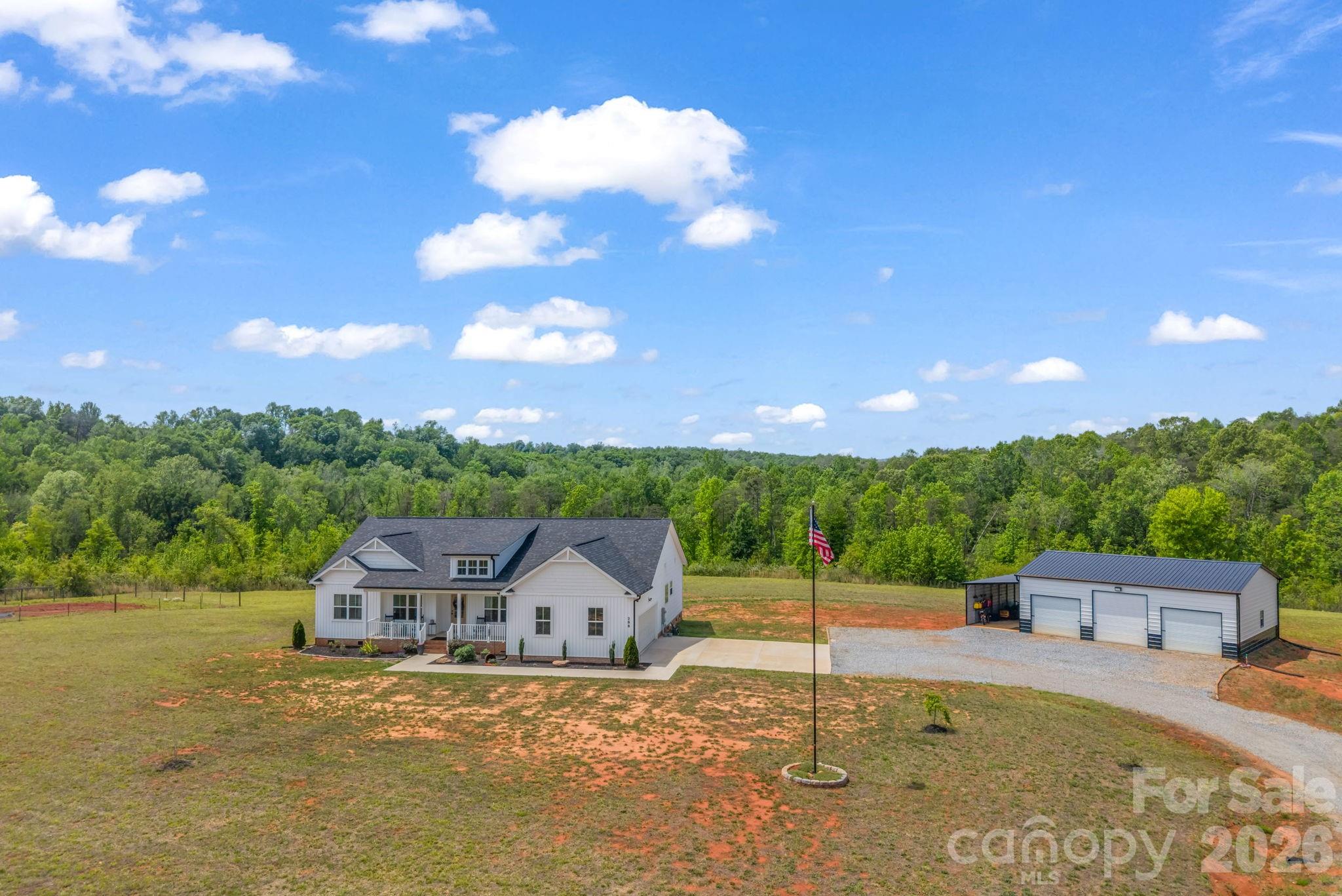 288 Maypole Court Forest City, NC 28043 - Photo 2 of 47 a view of a house with a big yard