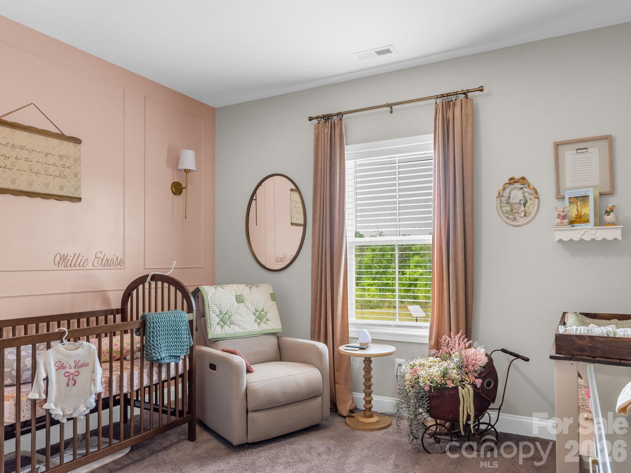 288 Maypole Court Forest City, NC 28043 - Photo 23 of 47 a bedroom with a bed and a large window