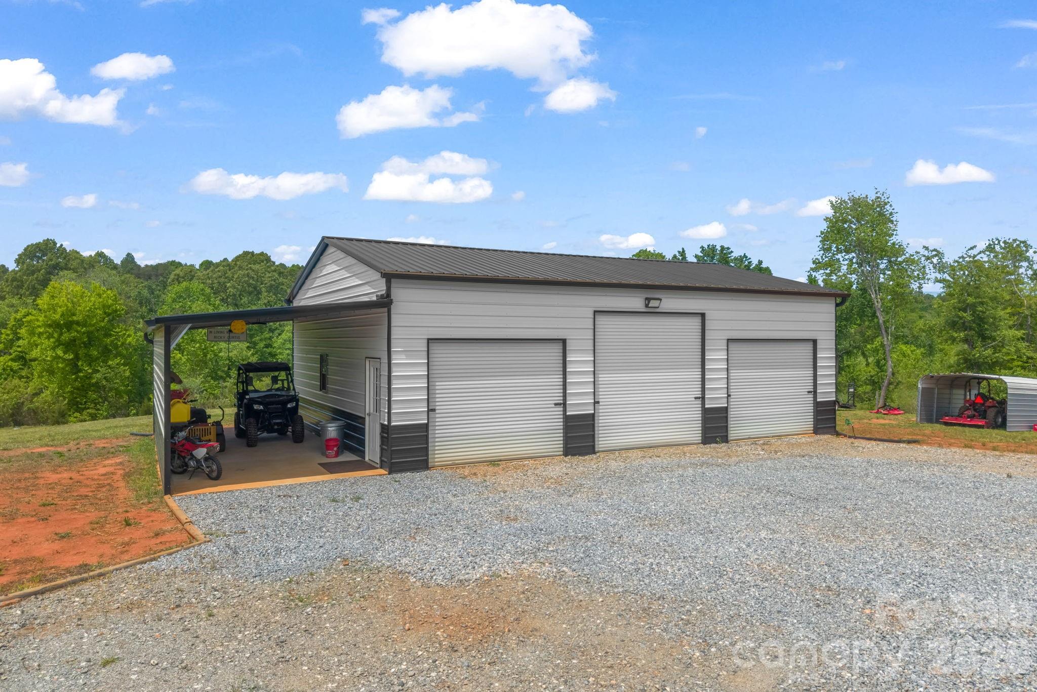 288 Maypole Court Forest City, NC 28043 - Photo 35 of 47 a view of a garage with a bike