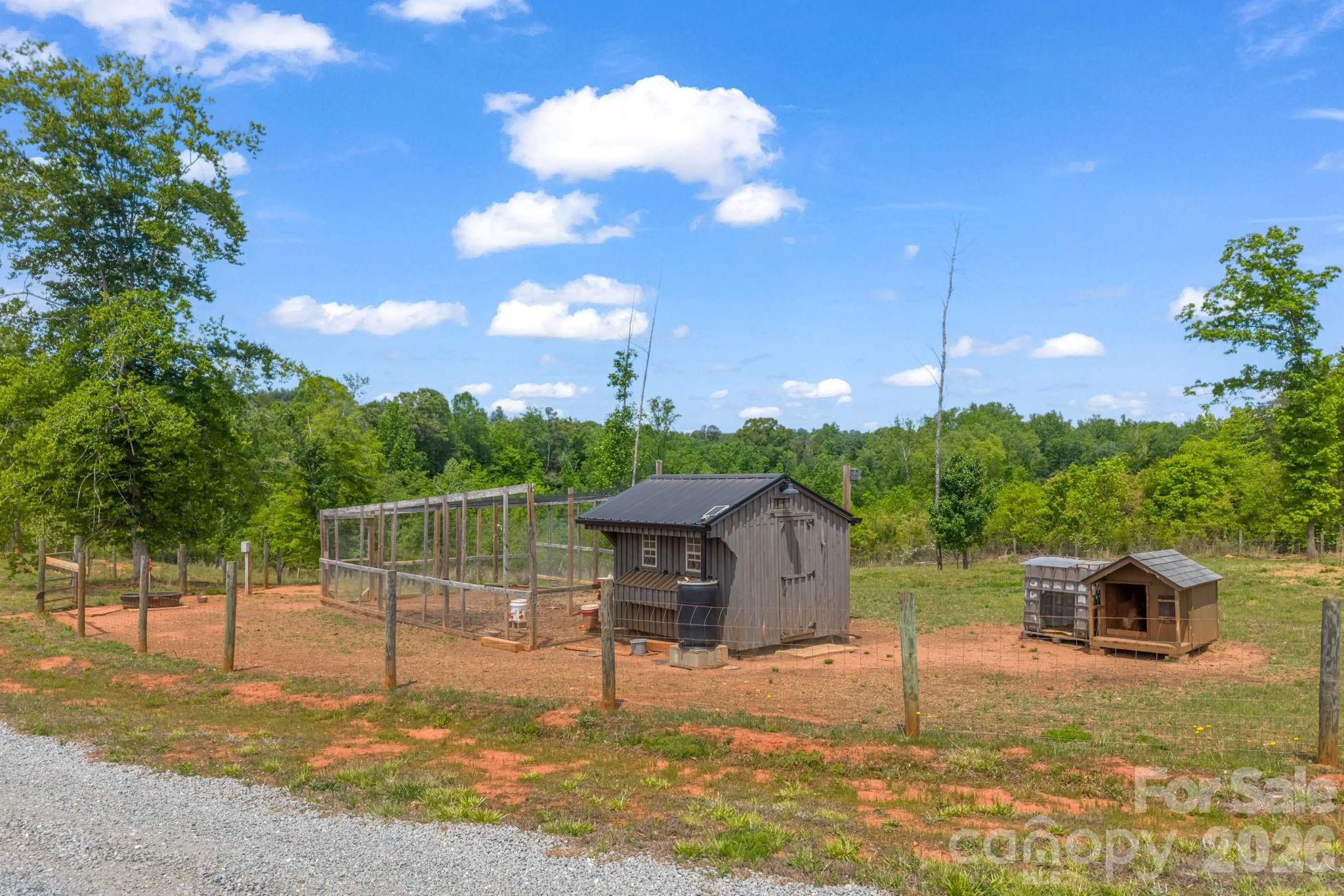 288 Maypole Court Forest City, NC 28043 - Photo 39 of 47 a backyard of a house with table and chairs