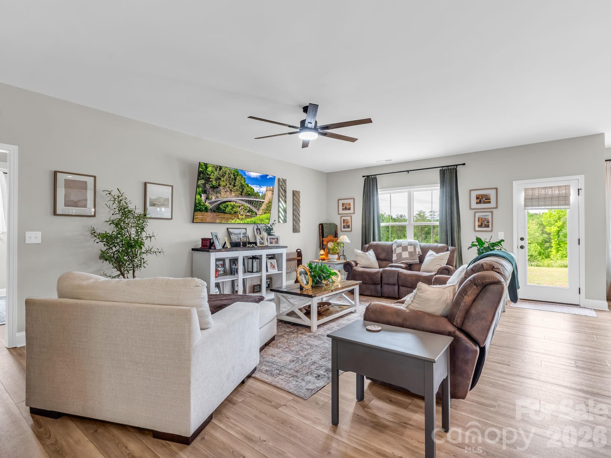 288 Maypole Court Forest City, NC 28043 - Photo 5 of 47 a living room with furniture and a large window