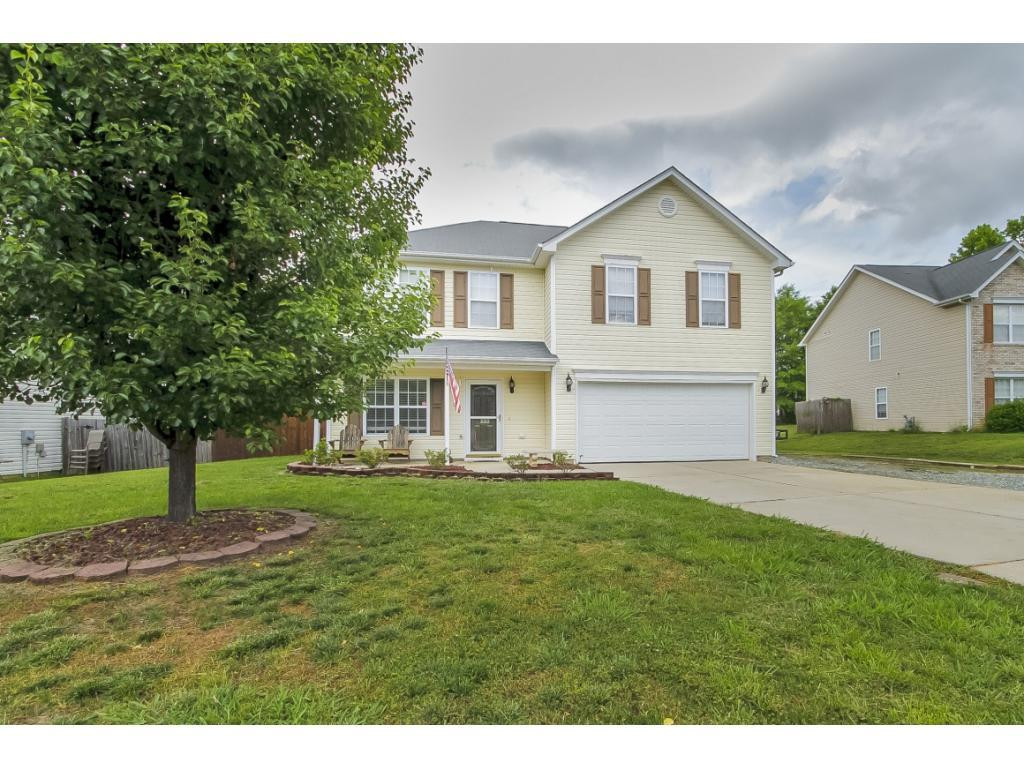 1223 Maple Burlington, NC 27217 - Photo 1 of 24 a view of house with garden