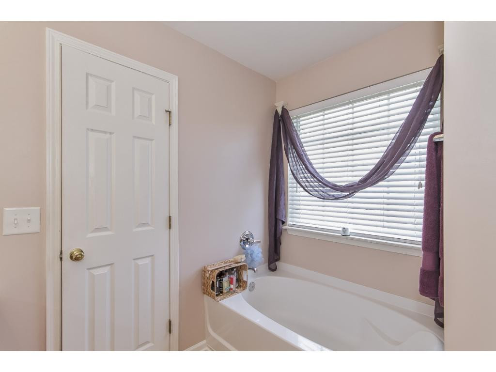 1223 Maple Burlington, NC 27217 - Photo 17 of 24 a view of a bedroom with a window