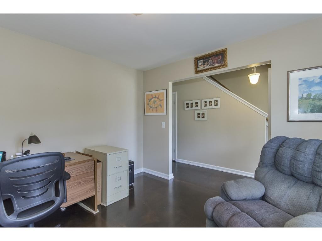 1223 Maple Burlington, NC 27217 - Photo 2 of 24 a view of room with furniture and a couch