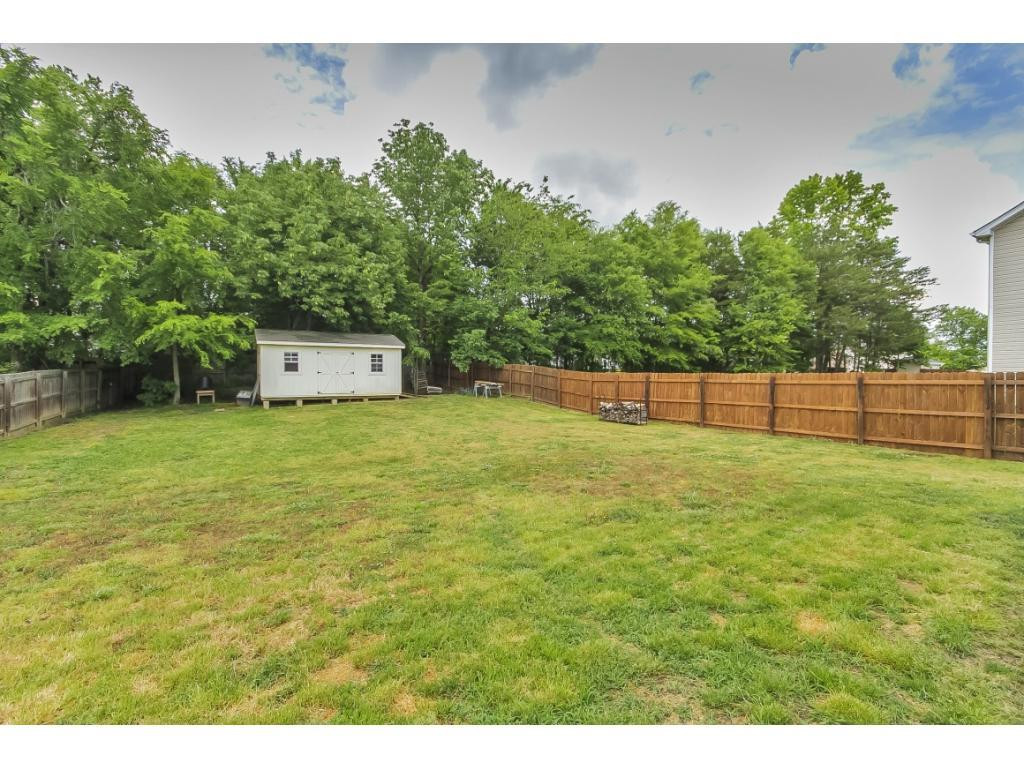 1223 Maple Burlington, NC 27217 - Photo 22 of 24 a view of a yard with an outdoor space