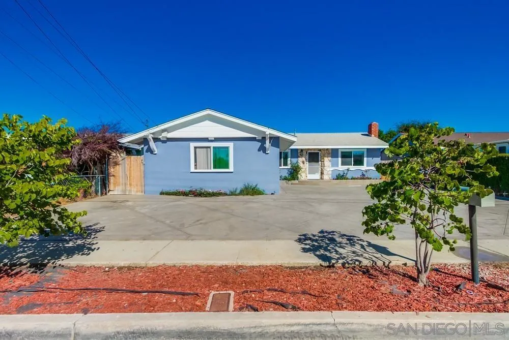 634 Daisy Street Escondido, CA 92027 - Photo 2 of 57 a front view of a house with a yard