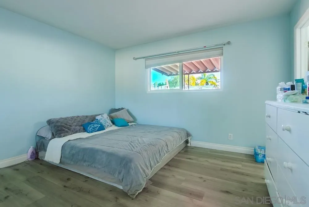 634 Daisy Street Escondido, CA 92027 - Photo 23 of 57 a bedroom with a bed and a window