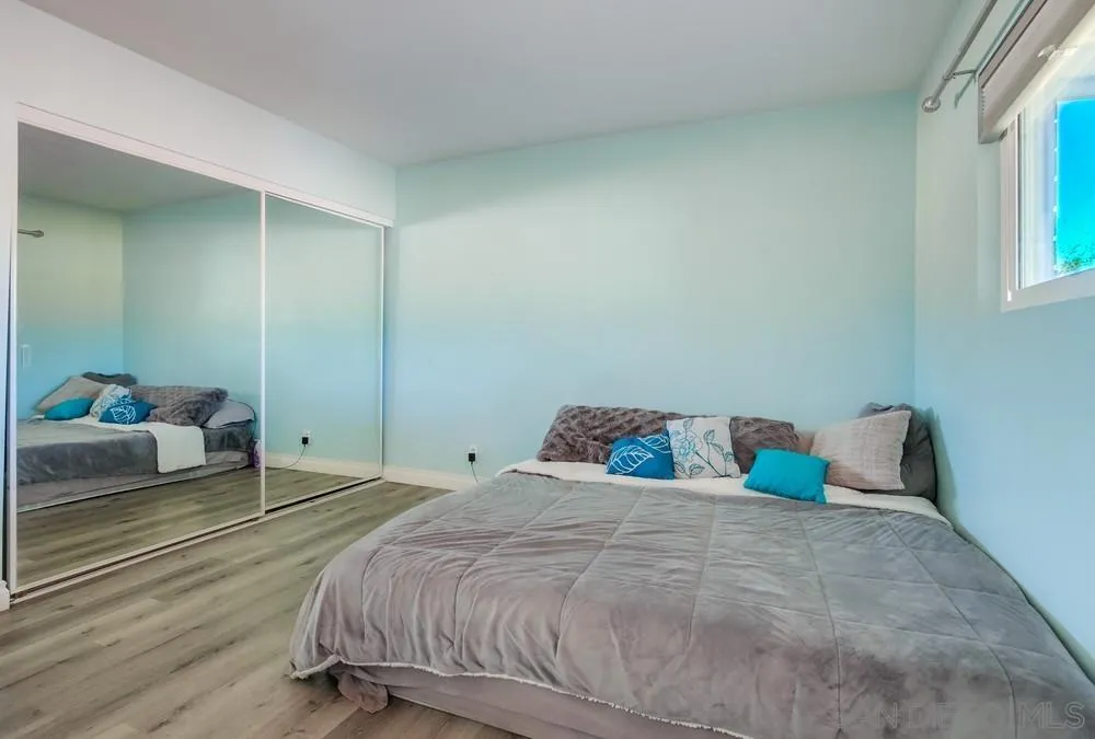 634 Daisy Street Escondido, CA 92027 - Photo 25 of 57 a bedroom with a bed and window