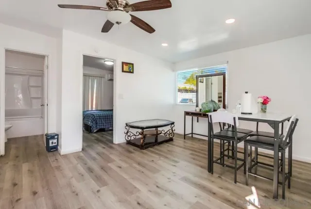 a bedroom that has a bed and a closet