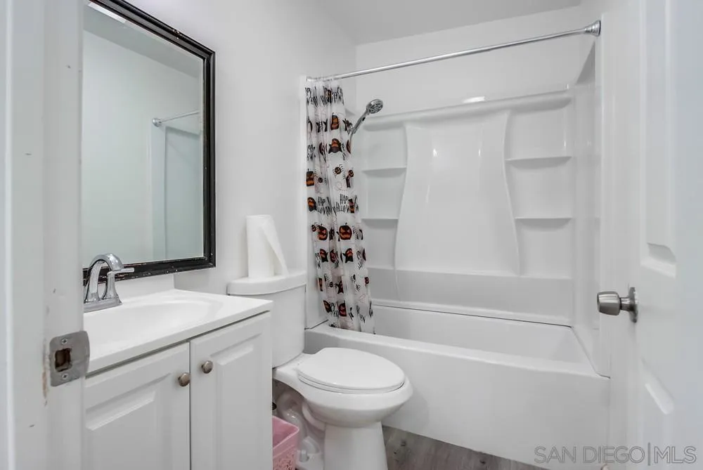 634 Daisy Street Escondido, CA 92027 - Photo 53 of 57 a bathroom with a sink a toilet and shower
