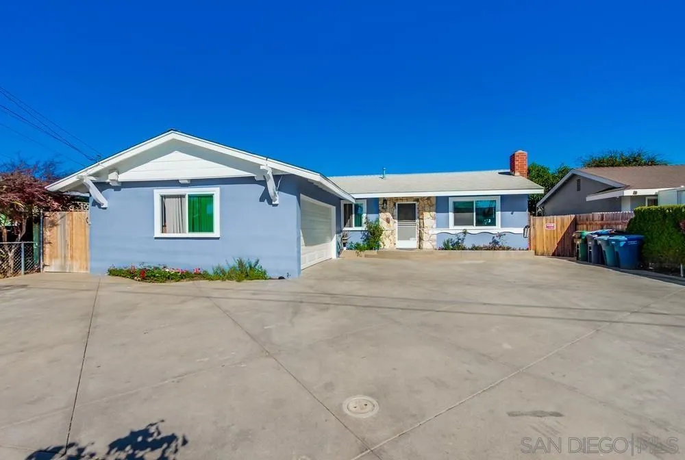 634 Daisy Street Escondido, CA 92027 - Photo 6 of 57 a front view of a house with a yard