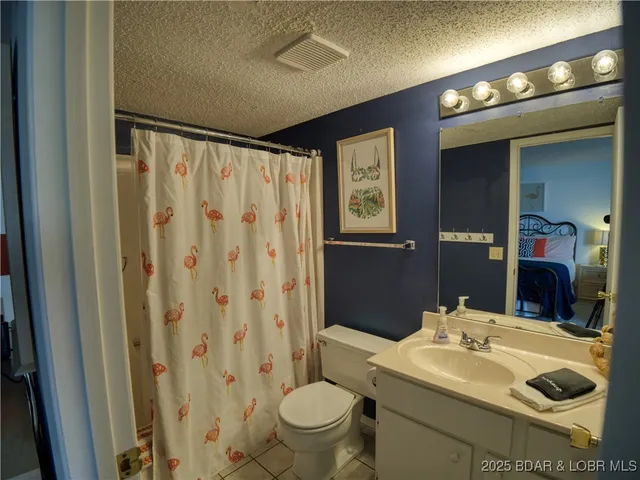 $995,000 | 87 Elbow Cay, Osage Beach, MO 65065