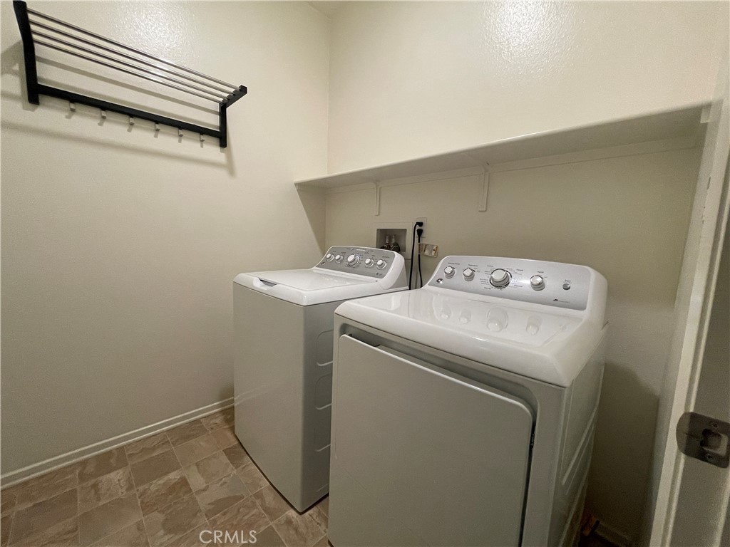 30360 Town Square Drive Menifee, CA 92584 - Photo 22 of 26 a utility room with dryer and washer