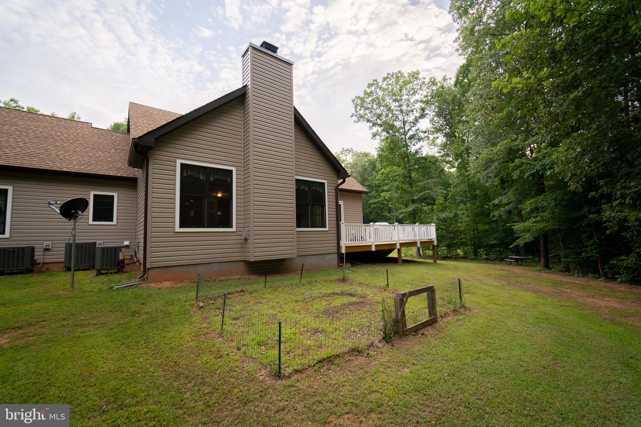 26585 Tatum Road Unionville, VA 22567 - Photo 73 of 76 Rear View of Main House Great Room