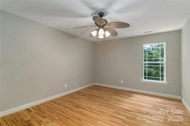 a workspace with furniture and wooden floor