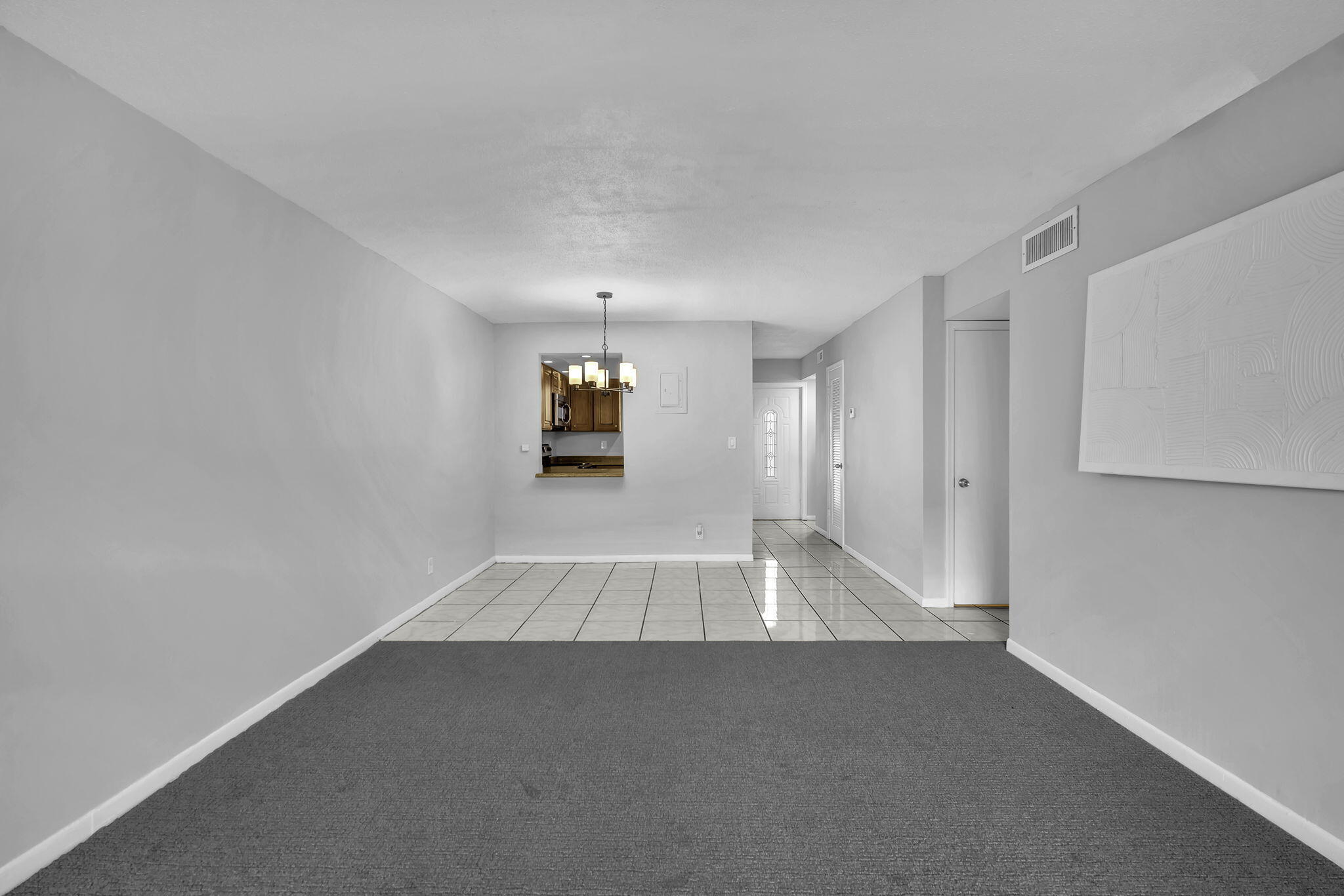 2130 Northeast 36th Street, Unit 63 Lighthouse Point, FL 33064 - Photo 13 of 21 a view of a room with an empty space